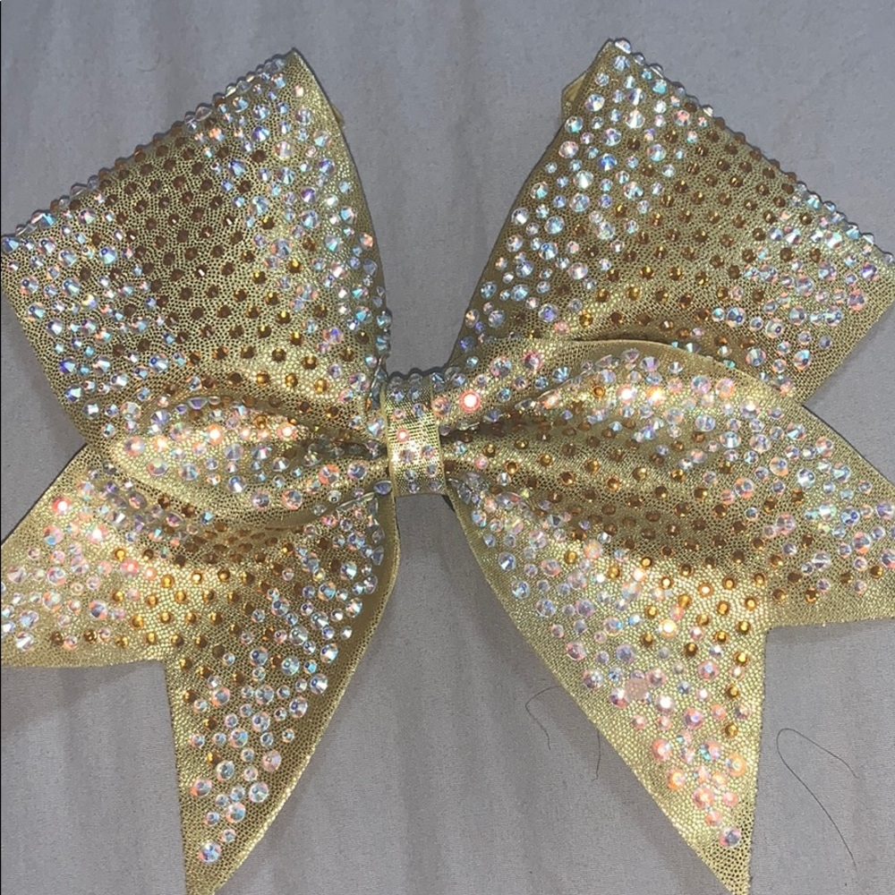 Gold sparkle cheer bow